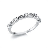 Ring 18 kt WG, 5 rund 0,22 ct, TW-si, 8 Brill. 0,03 ct, TW-si