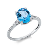 Ring 14 kt WG, 8 Dia. 0,03 ct, TW-si, 1 Topas 2,07 ct blau