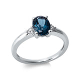 Ring 18 kt WG, 2 Brill. 0,07 ct, TW-si, 1 Topas 1,39 ct Lond. blue