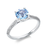 Ring 18 kt WG, 44 Brill. 0,15 ct, TW-si, 1 Topas 1,59 ct sky blue