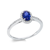 Ring 18 kt WG, 32 Brill. 0,14 ct, TW-si, 1 Saphir 0,51 ct blau