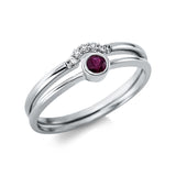 Ring 18 kt WG, 5 Brill. 0,03 ct, TW-si, 1 Rubin 0,14 ct rot