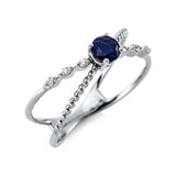 Ring 18 kt WG, 6 Brill. 0,05 ct, TW-si, 1 Saphir 0,27 ct blau