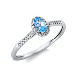 Ring 18 kt WG, 16 Dia. 0,04 ct, TW-si, 14 Dia. 0,04 ct, TW-si, 1 Topas 0,28 ct blau