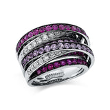 Ring 18 kt WG, Fassung teils schwarz rhodinie, 32 Brill. 0,85 ct, TW-vsi/si, 89 Saphire 3,20 ct pink