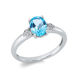 Ring 18 kt WG, 8 Dia. 0,03 ct, TW-si, 1 Topas 1,37 ct blau