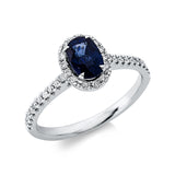 Ring 18 kt WG, 34 Brill. 0,24 ct, TW-si, 1 Saphir 1,17 ct blau