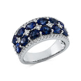 Ring 18 kt WG, 49 Brill. 0,55 ct, TW-si, 12 Saphire 3,63 ct blau