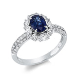 Ring 18 kt WG,4 Brill. 0,16 ct, TW-si, 4 Nav. 0,37 ct,TW-si, 42 Brill. 0,30 ct, TW-si, 1 Saphir 1,02 ct blau