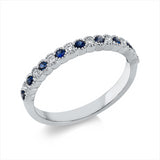 Ring 18 kt WG, 8 Brill. 0,14 ct, W-si, 9 Saphire 0,20 ct blau