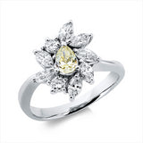 Ring 900 Pt Platin, 9 Fant-Schl. 0,87 ct, TW-si, 1 Tropfen 0,37 ct, gelb