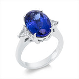 Ring 950 Pt Platin, 2 Triangel 0,43 ct, TW-si, 1 Tansanit 7,82 ct blau