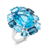 Ring 18 kt WG, 7 Topase 6,10 ct blau, 1 Topas 16,20 ct blau, 3 Topase 2,80 ct Lond. blue