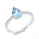 Ring 18 kt WG, 6 Brill. 0,03 ct, TW-si, 14 Brill. 0,04 ct, TW-si, 1 Topas 1,23 ct sky blue