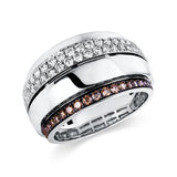 Ring 18 kt WG, Fassung teils schwarz rhodinie, 49 Brill. 0,69 ct, TW-si, 23 Brill. 0,31 ct, braun