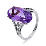 Ring 18 kt WG, 36 Brill. 0,19 ct, TW-si, 1 Amethyst 7,60 ct lila