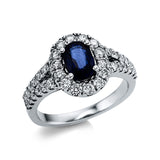 Ring 18 kt WG, 38 Brill. 0,91 ct, TW-si, 1 Saphir 1,49 ct blau