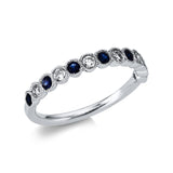 Ring 18 kt WG, 6 Brill. 0,23 ct, TW-si, 7 Saphire 0,31 ct blau