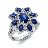 Ring 18 kt WG, 8 Trap. 0,24 ct, TW-si, 82 Brill. 0,81 ct, TW-si, 9 Saphire 2,45 ct blau