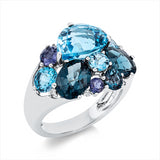 Ring 18 kt WG, 6 Brill. 0,05 ct, TW-si, 3 Topase 3,10 ct Lond. blue, 4 Topase 6,00 ct blau, 3 Iolith 0,50 ct blau